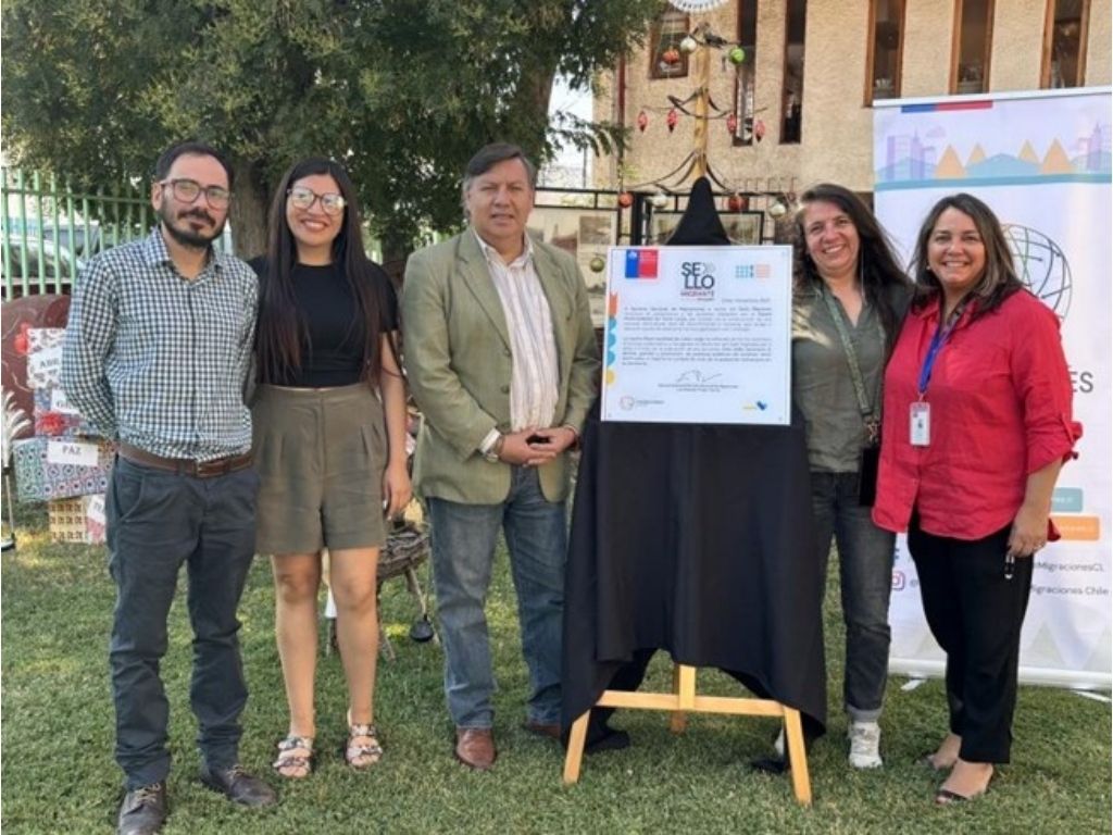 Entrega de placa Sello Migrante